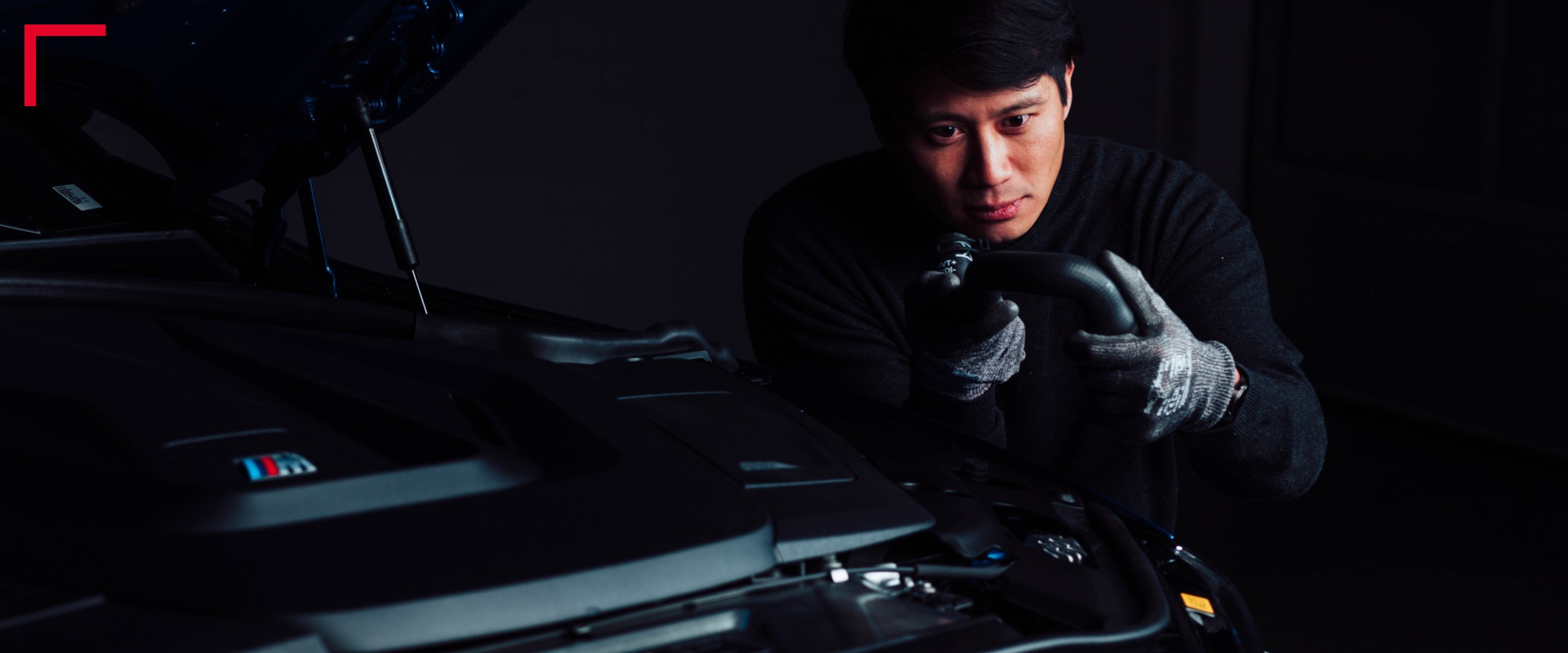 Closeup of person working on car Image